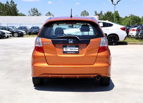 Orange Revolution Metallic 2010 Honda Fit Sport