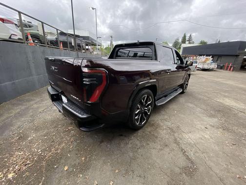 Dark Ember Tintcoat 2025 GMC Sierra EV Max Range Denali