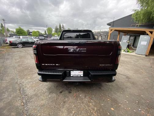 Dark Ember Tintcoat 2025 GMC Sierra EV Max Range Denali