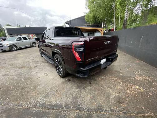 Dark Ember Tintcoat 2025 GMC Sierra EV Max Range Denali
