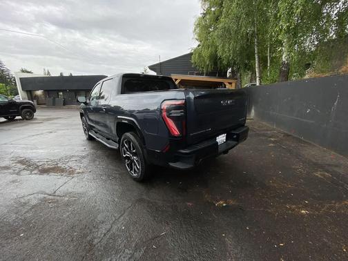 Deep Ocean Metallic 2025 GMC Sierra EV Max Range Denali