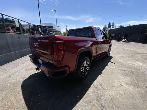Volcanic Red Tintcoat 2026 GMC Sierra 1500 AT4