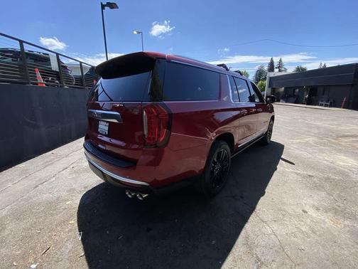 Volcanic Red Tintcoat 2024 GMC Yukon XL Denali