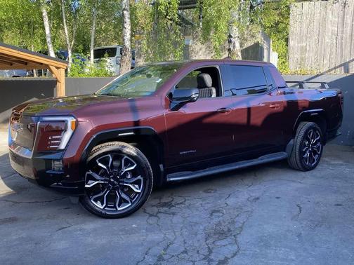 Dark Ember Tintcoat 2025 GMC Sierra EV Max Range Denali