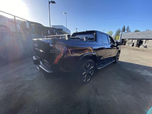 Dark Ember Tintcoat 2025 GMC Sierra EV Max Range Denali