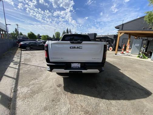 Summit White 2025 GMC Sierra EV Max Range Denali