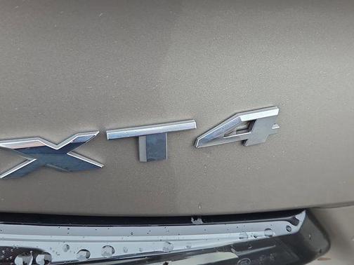 Latte Metallic 2024 Cadillac XT4 Sport