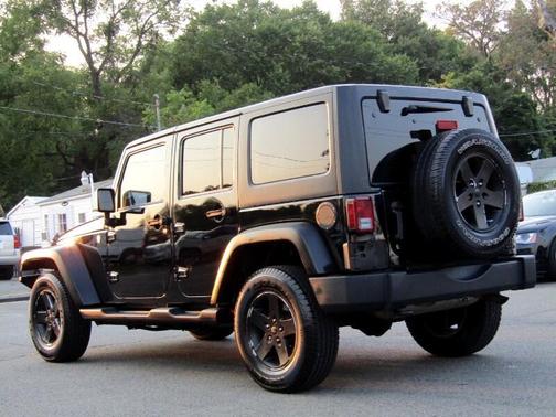 Photo 5 of 24 of 2014 Jeep Wrangler Unlimited Sport