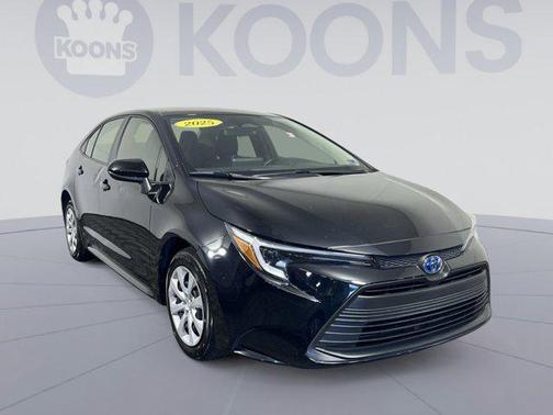 Midnight Black Metallic 2025 Toyota Corolla Hybrid SE