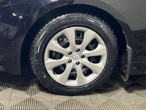 Midnight Black Metallic 2025 Toyota Corolla LE