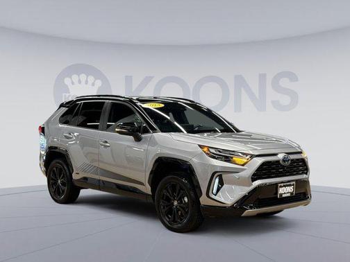Silver Sky Metallic/Midnight Black Metallic 2023 Toyota RAV4 Hybrid SE