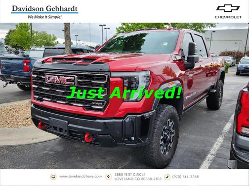 Volcanic Red 2025 GMC Sierra 2500 AT4X