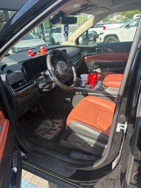 Aurora Black Pearl 2025 Kia Carnival Hybrid SX Prestige