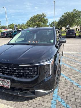 Aurora Black Pearl 2025 Kia Carnival Hybrid SX Prestige