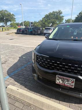 Aurora Black Pearl 2025 Kia Carnival Hybrid SX Prestige