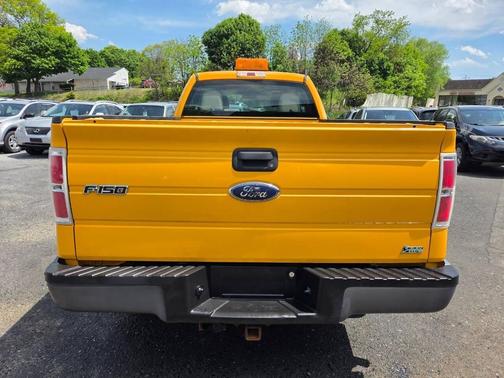 Yellow 2010 Ford F-150 XL