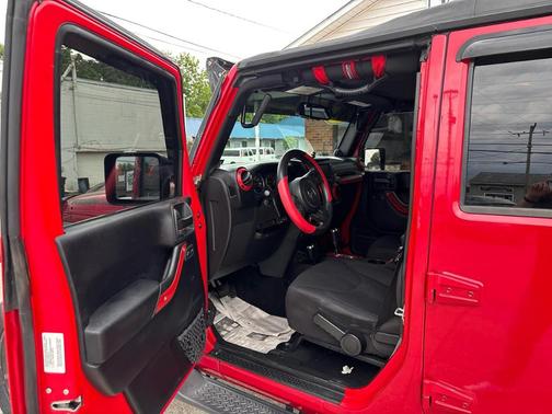 Red 2014 Jeep Wrangler Unlimited Sport