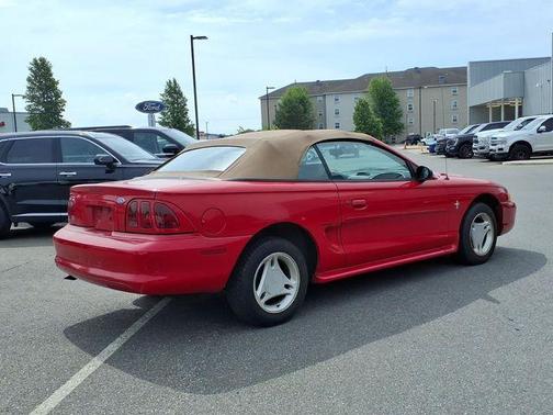 Red 1997 Ford Mustang