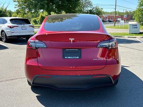 Red 2024 Tesla Model Y Long Range