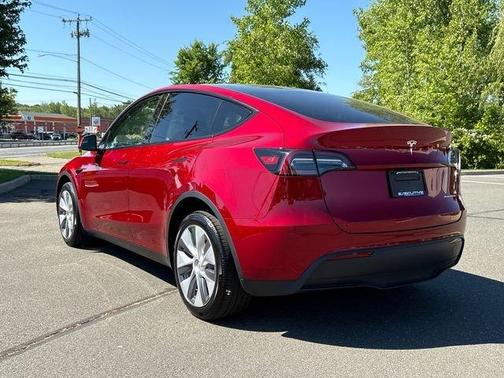 Red 2024 Tesla Model Y Long Range