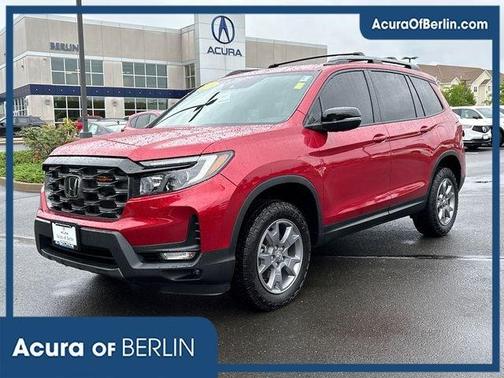 Red 2025 Honda Passport TrailSport