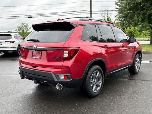Red 2025 Honda Passport TrailSport