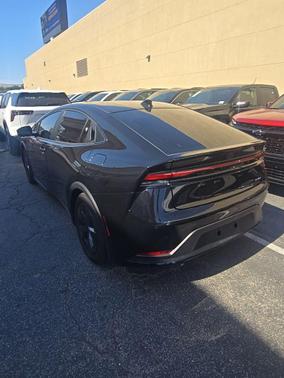 Midnight Black Metallic 2025 Toyota Prius LE