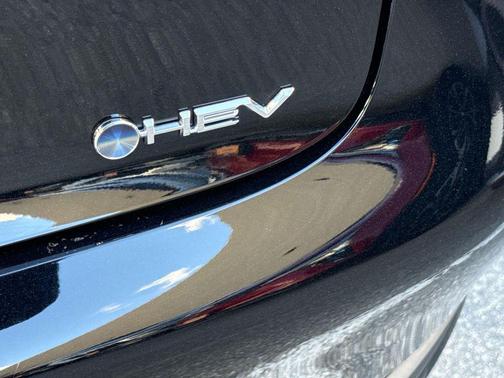 Midnight Black Metallic 2025 Toyota Prius LE