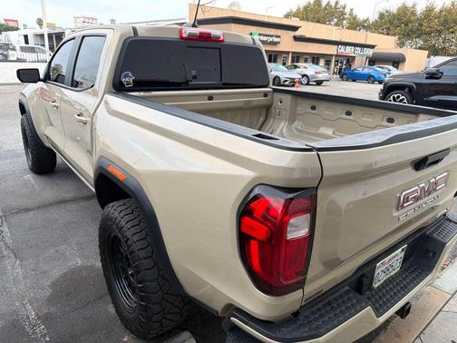 Desert Sand Metallic 2024 GMC Canyon AT4