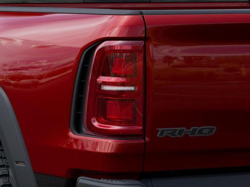 Red 2026 RAM 1500 RHO Crew Cab 4x4 5'7' Box