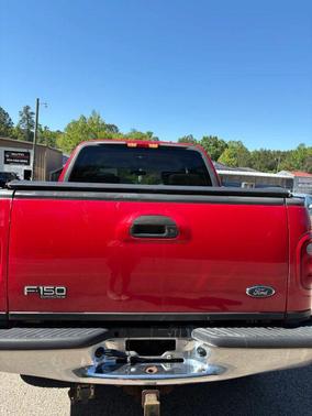 Red 2002 Ford F-150 King Ranch SuperCrew