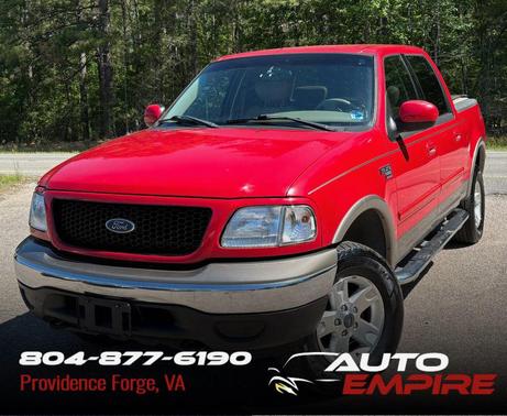 Red 2002 Ford F-150 King Ranch SuperCrew