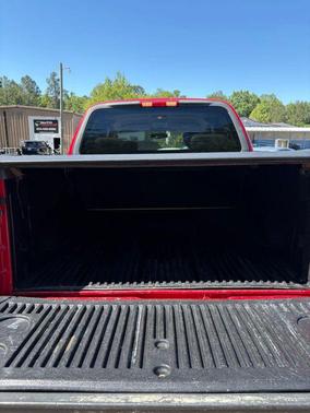 Red 2002 Ford F-150 King Ranch SuperCrew