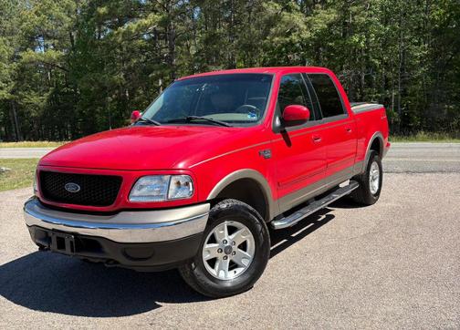 Red 2002 Ford F-150 King Ranch SuperCrew