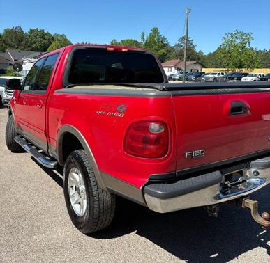 Red 2002 Ford F-150 King Ranch SuperCrew