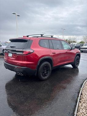 Red 2025 GMC Acadia AT4