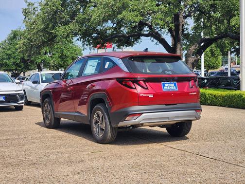 Ultimate Red 2026 Hyundai TUCSON Hybrid Blue SE