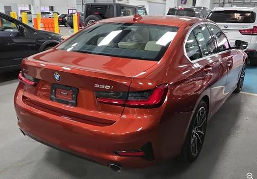 Sunset Orange Metallic 2021 BMW 330 xDrive