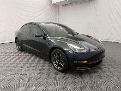 Solid Black 2023 Tesla Model 3 Standard Range Plus