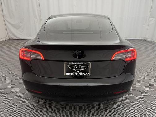 Solid Black 2023 Tesla Model 3 Standard Range Plus