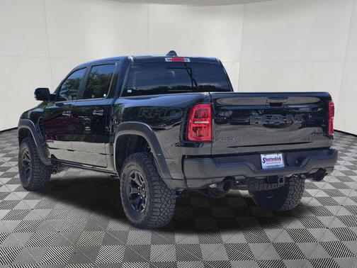 Diamond Black Crystal Pearlcoat 2026 RAM 1500 RHO Crew Cab 4x4 5'7' Box