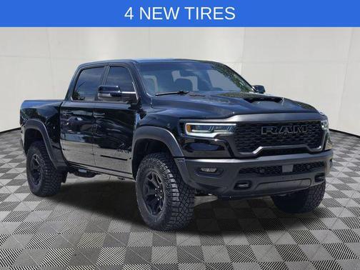 Diamond Black Crystal Pearlcoat 2026 RAM 1500 RHO Crew Cab 4x4 5'7' Box