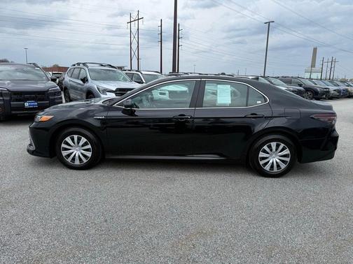 Midnight Black Metallic 2021 Toyota Camry Hybrid LE
