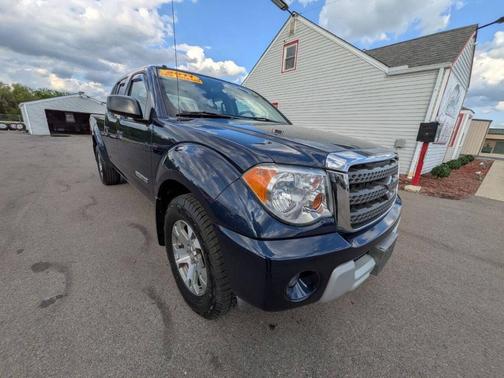 Blue 2011 Suzuki Equator Sport