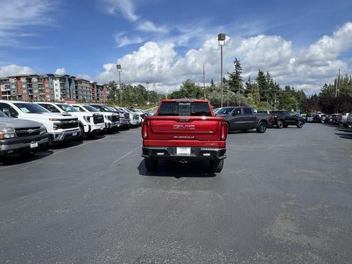 Volcanic Red Tintcoat 2024 GMC Sierra 1500 AT4X