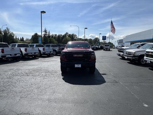 Volcanic Red Tintcoat 2024 GMC Sierra 1500 AT4X