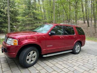 Red Fire Clearcoat Metallic 2004 Ford Explorer Limited