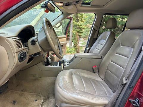 Red Fire Clearcoat Metallic 2004 Ford Explorer Limited