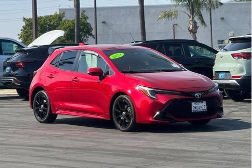 Red 2024 Toyota Corolla Hatchback SE