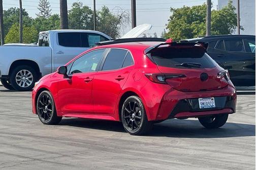 Red 2024 Toyota Corolla Hatchback SE